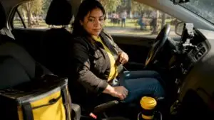 Gig driver preparing vehicle for service