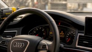 Audi dashboard with air suspension warning light