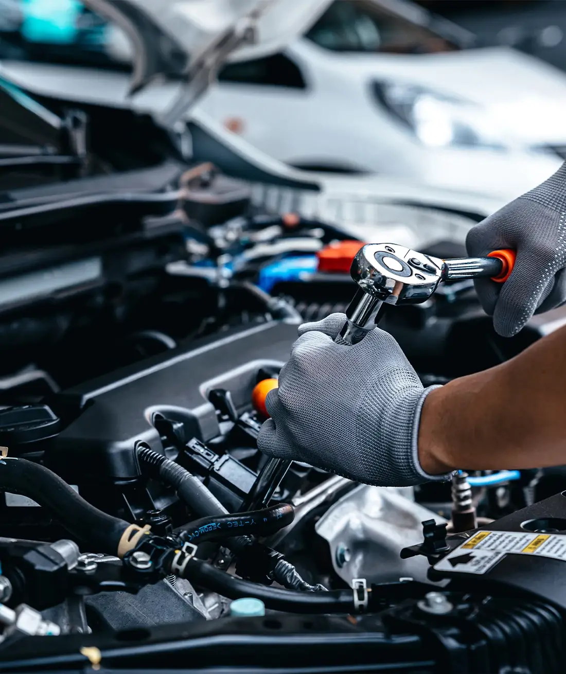 Auto mechanic performing vehicle repair in Fort Worth, TX